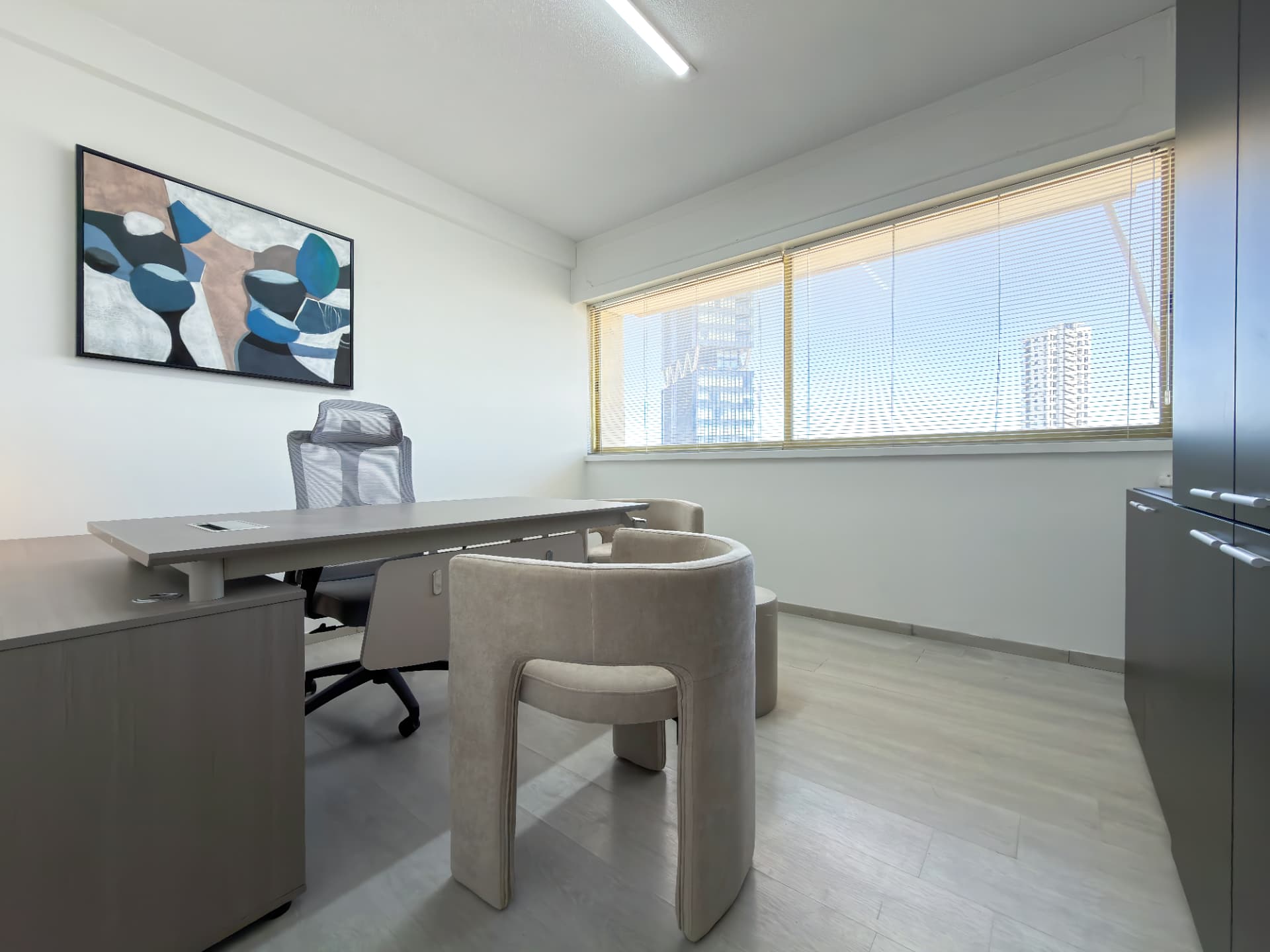Gallery Office desk beside the skyline window